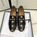 Gucci Womens Jordaan Loafers in Black Leather with Bees and Stars